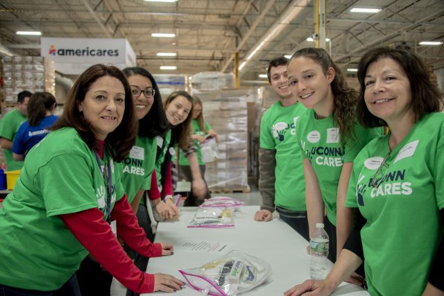 UConn Volunteers preparing emergency kits at Americares HQ