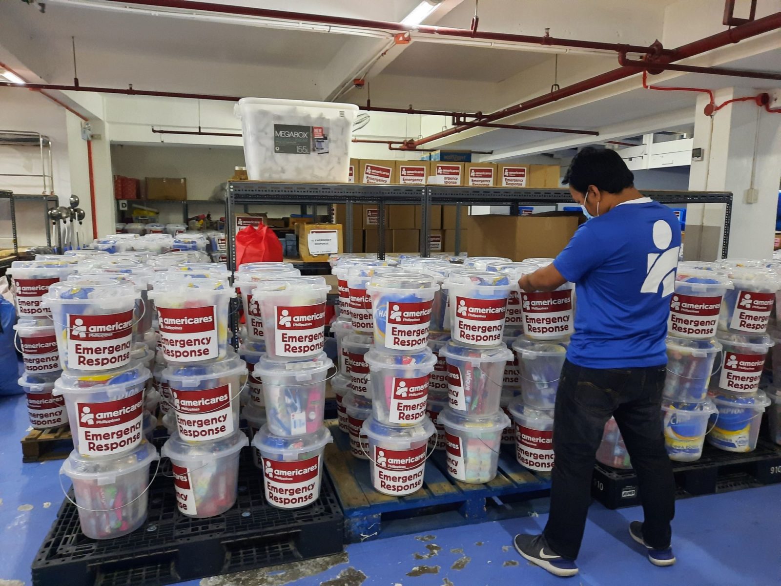 Americares staff prepare emergency supplies