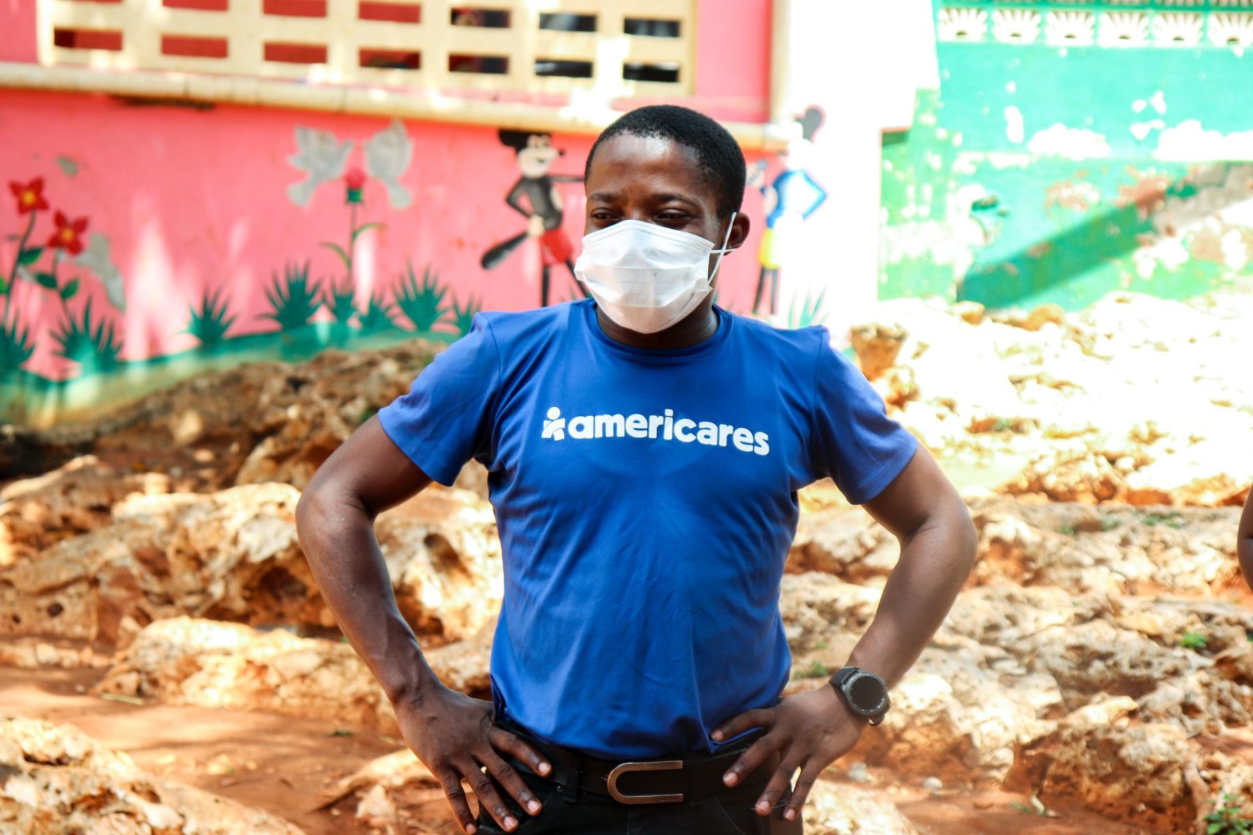 Dr. Waly looking at handwashing station in Haiti