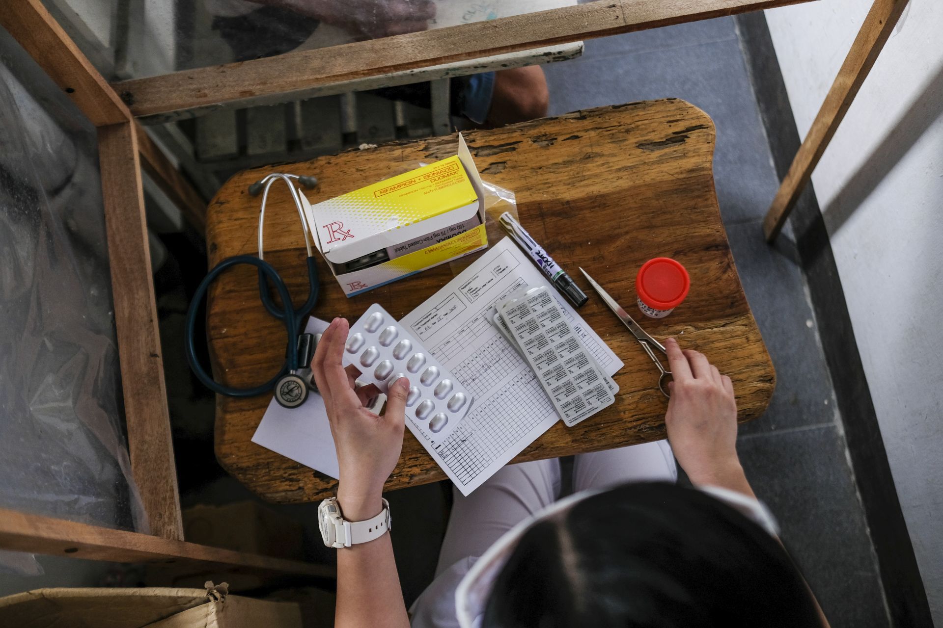 Abielle Cerda, a public health nurse, attends to her duties during her shift at the Rural Health Unit clinic in Mabitac, Laguna Philippines November 17, 2020. (Veejay Villafranca/Americares)