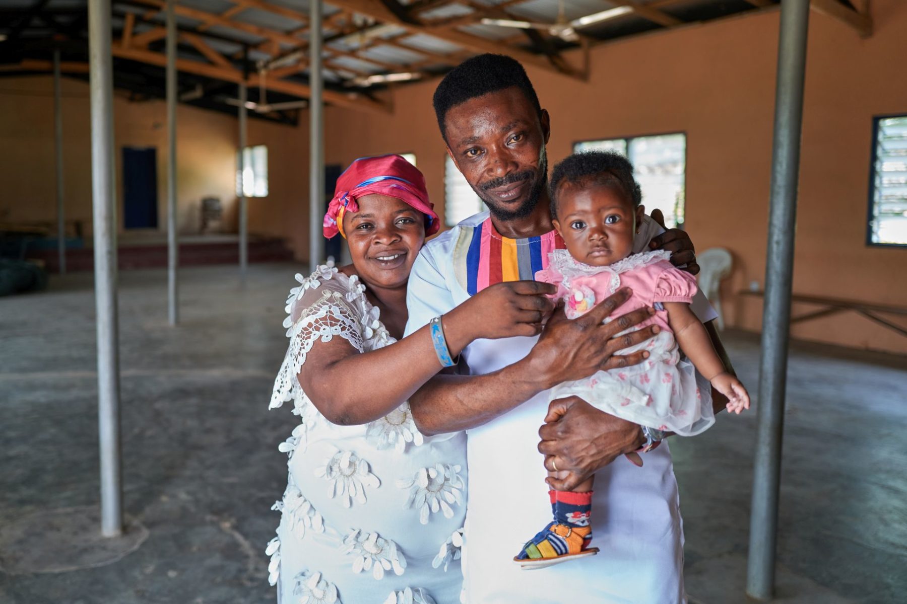 Ellen and her husband Richard with their 5-month old daughter in Ghana.