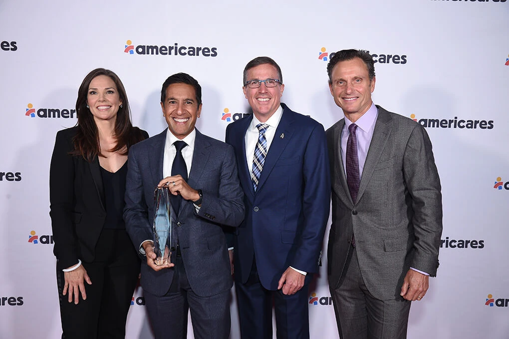 Photo of Erica Hill, Dr. Gupta, Michael Nyenhuis, and Tony Goldwyn