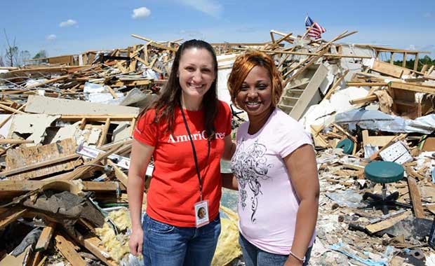 Kate with tornado survivor in Mississippi.