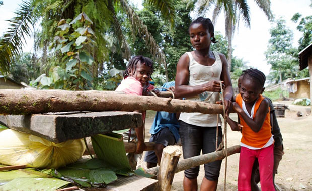 Martina and her children at work