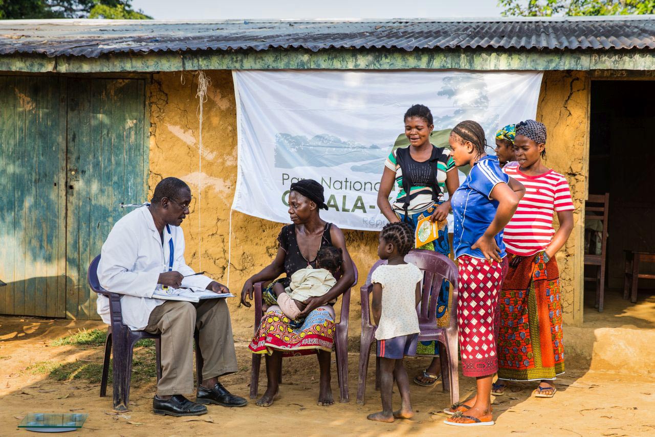 Patients receive medical care near Odzala-Kokoua National Park in the Congo, one of 15 national parks and protected areas managed by African Parks. Photo by Marcus Westberg.