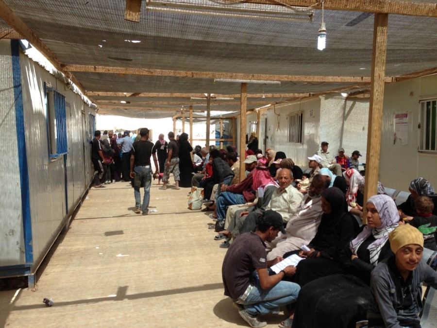 Patients awaiting care in refugee camp