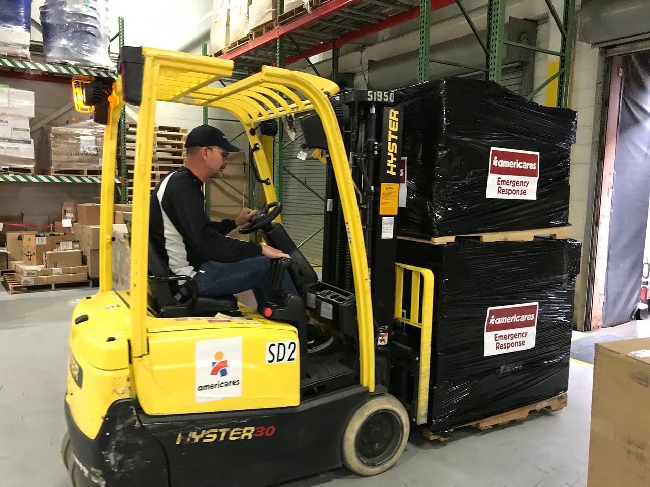 Loading shipment of masks for health workers